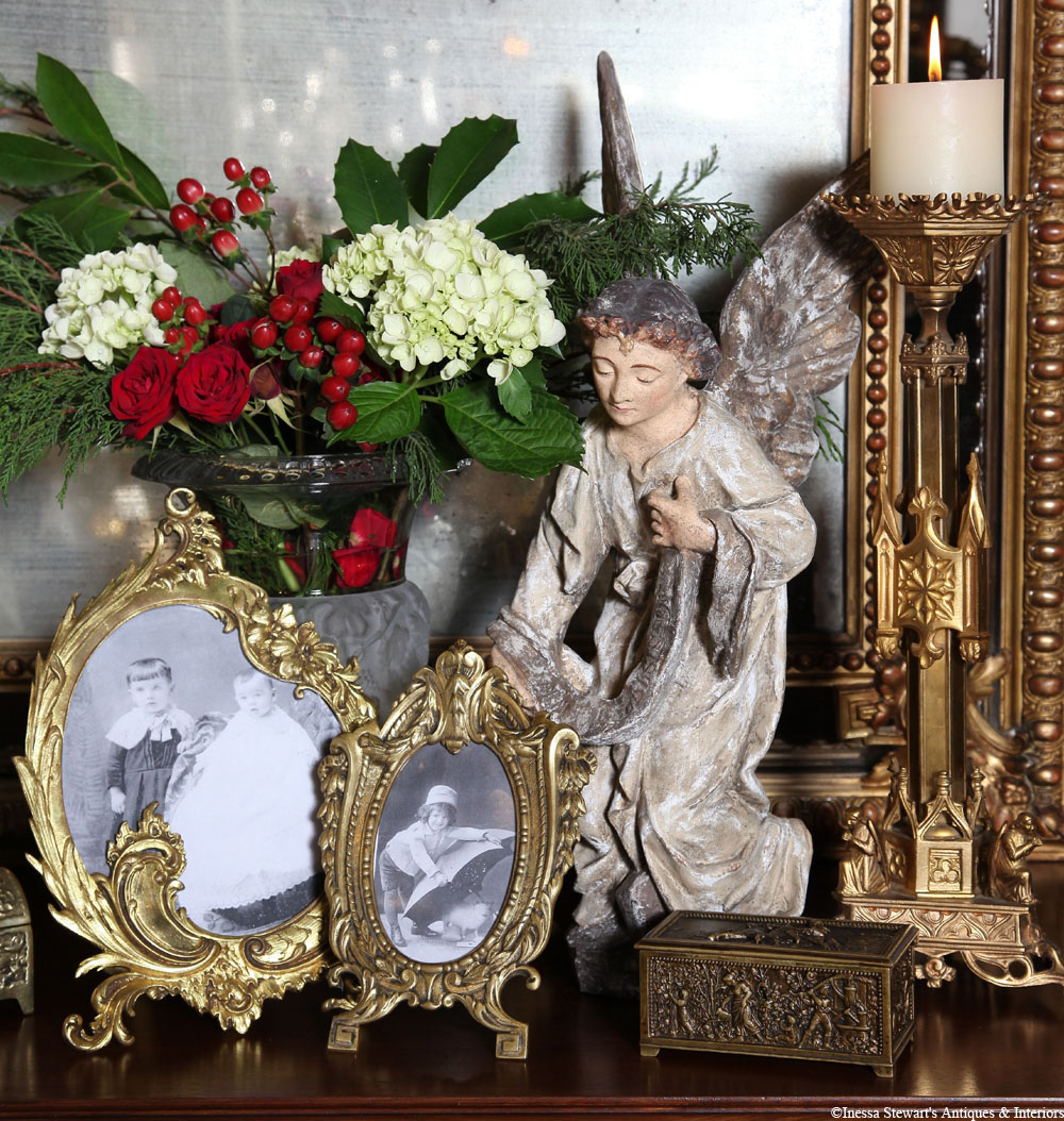 Antique accessories, mirror, Christmas decorations, and flowers close-up at Inessa Stewart's Antiques