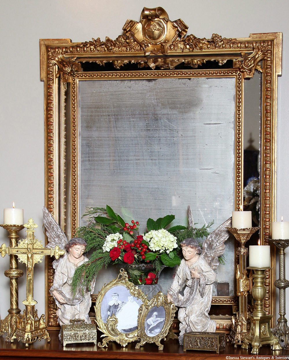 Antique accessories, mirror, Christmas decorations, and flowers at Inessa Stewart's Antiques