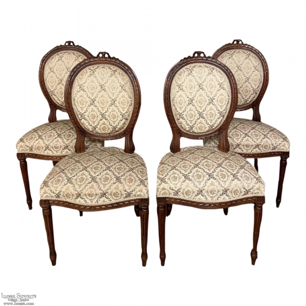 Set of Four 19th Century French Louis XVI Walnut Chairs