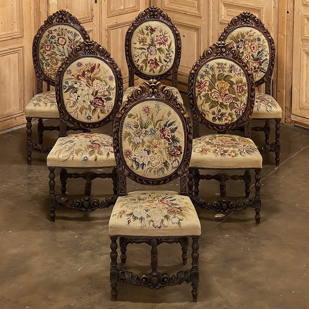 Pair of Louis XV style French armchairs with original needlepoint.