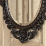Late 19th to Early 20th Century Renaissance Revival Hand-Carved Beveled Mirror