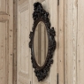 Late 19th to Early 20th Century Renaissance Revival Hand-Carved Beveled Mirror