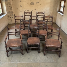 Set of Ten Country French Oak Dining Chairs in the Louis XIII Style, includes 2 Armchairs