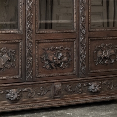 19th Century Renaissance Revival Hand-Carved Oak Triple Bookcase