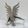 Pair of Antique Silver-Plated Brass Fighting Cocks