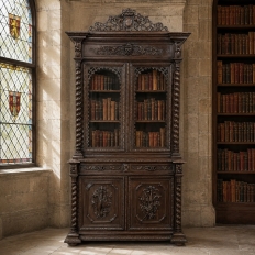 19th Century French Carved Oak Hunt Bookcase with Barley Twist Columns
