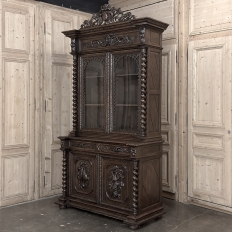 19th Century French Carved Oak Hunt Bookcase with Barley Twist Columns