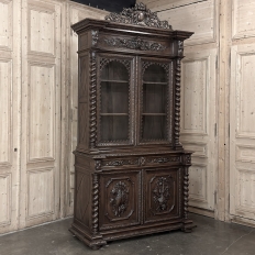 19th Century French Carved Oak Hunt Bookcase with Barley Twist Columns
