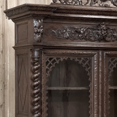 19th Century French Carved Oak Hunt Bookcase with Barley Twist Columns