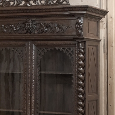 19th Century French Carved Oak Hunt Bookcase with Barley Twist Columns